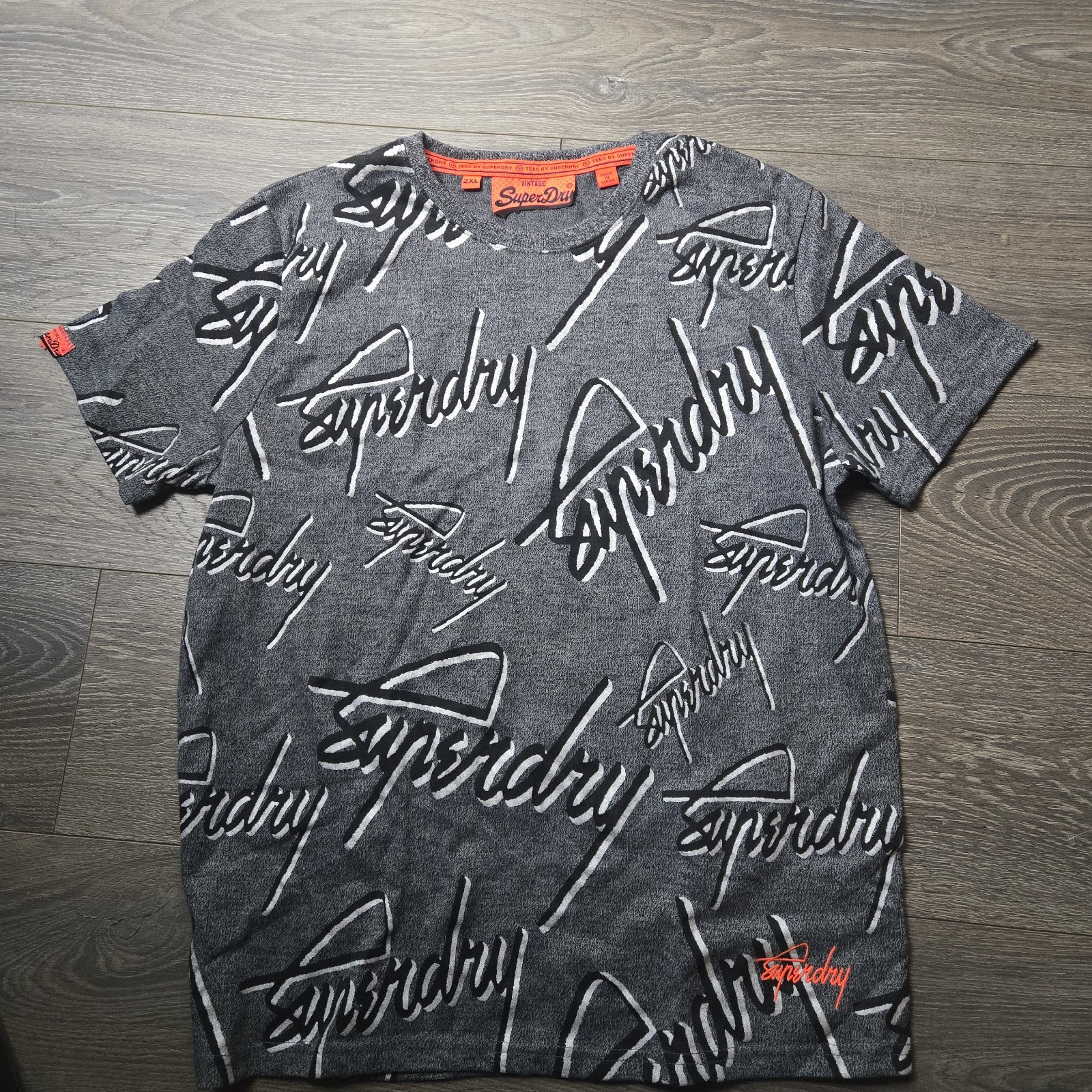 img_1771443346210_0-1.jpeg Vintage Superdry T Shirt Mens 2XL White All Over Spell Out Logo