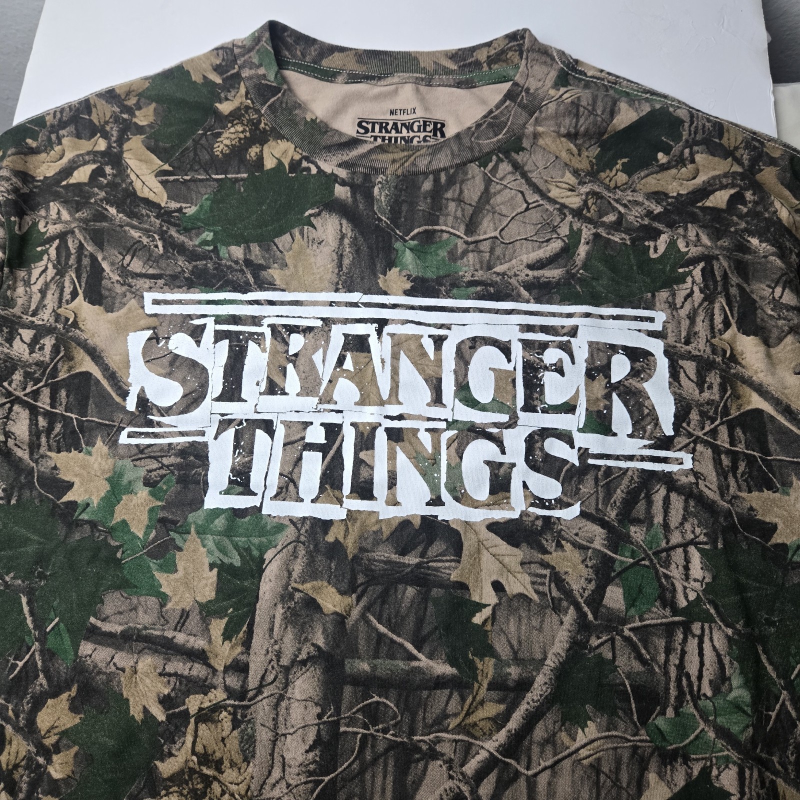 img_1771527886941_0-1.jpeg stranger things shirt Green Camo