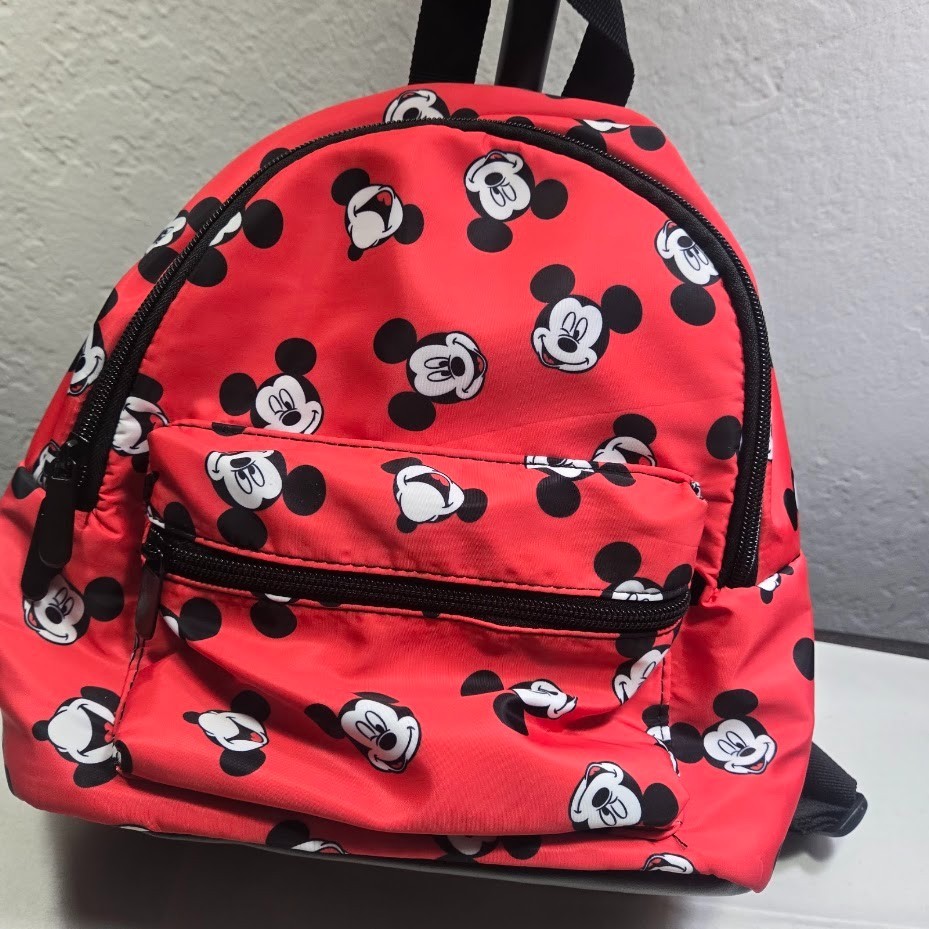 img_1771528665077_0-1.jpeg Disney's Mickey Mouse All Over Red & Black Classic Mini Backpack
